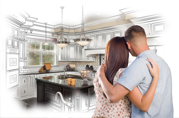 young couple looking at kitchen