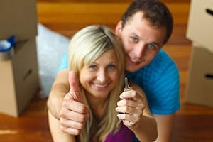 couple giving the thumbs up